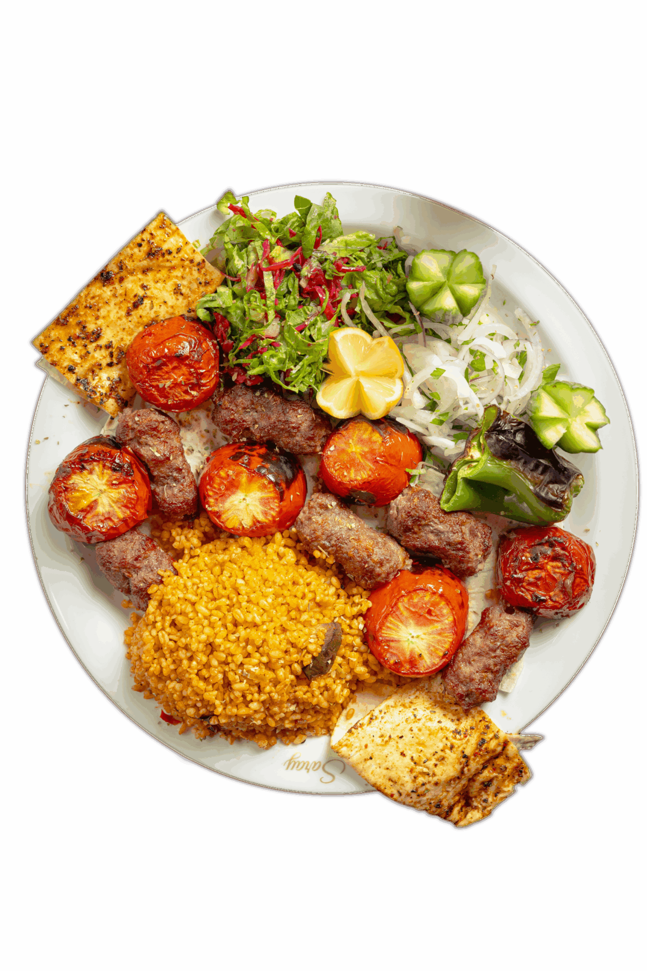 Kebab accompagné de tomates grillées et pilaf
